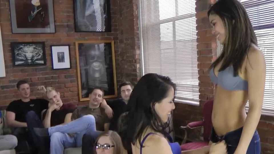 A big orgy after the girls play a nice strip game 