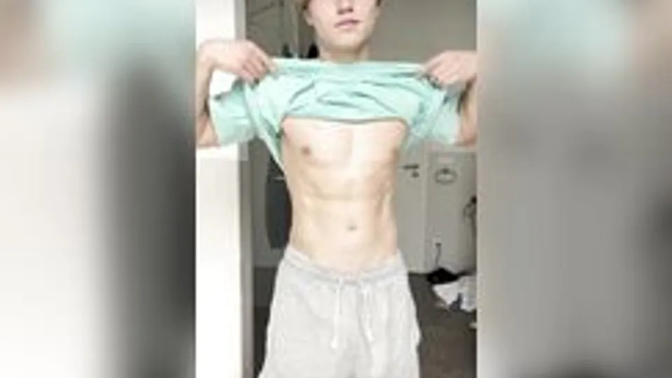 a blond guy masturbates and ejaculates