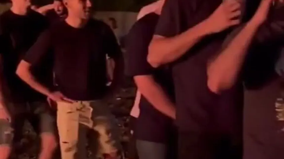 A boy receives kisses from all his friends