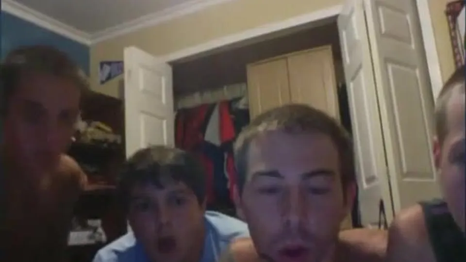 A group of friends show their cocks