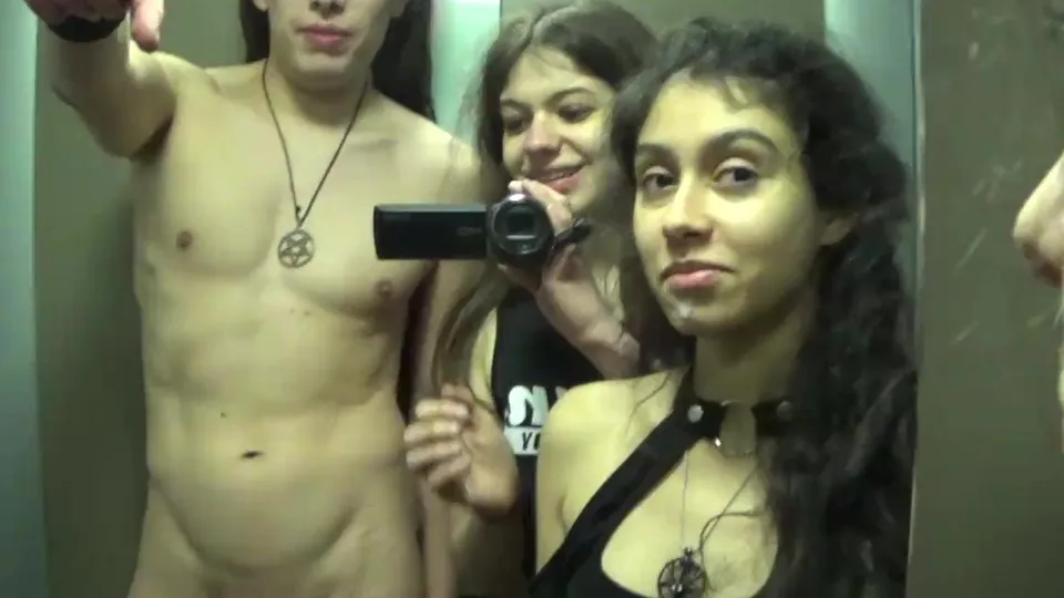 Amateur teens had a risky FFM in the elevator POV