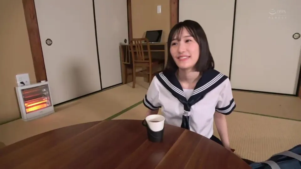 Asian Girl in Sailor Uniform Drinks Coffee