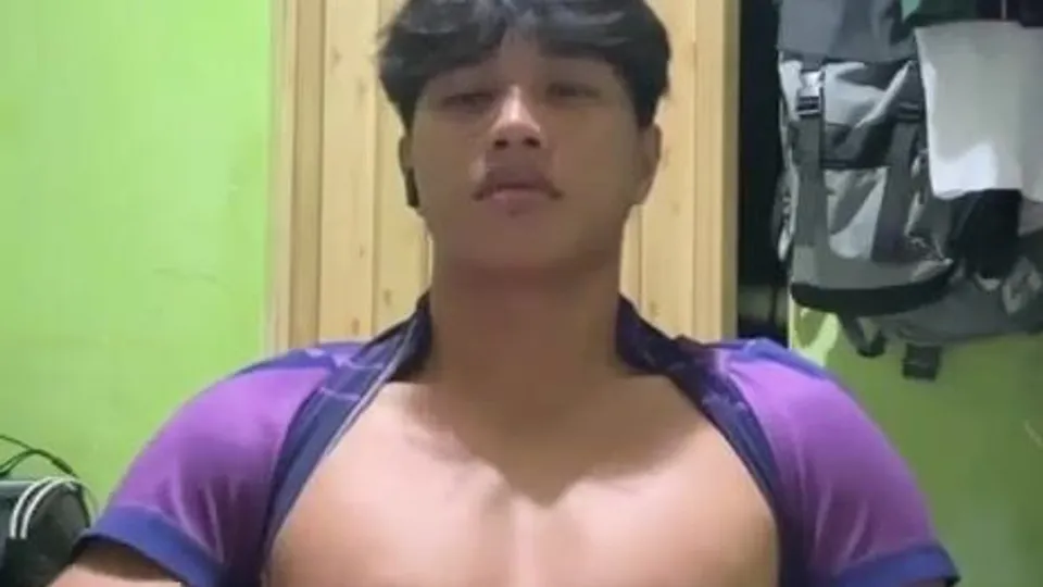 Asian athlete boy cums after practice