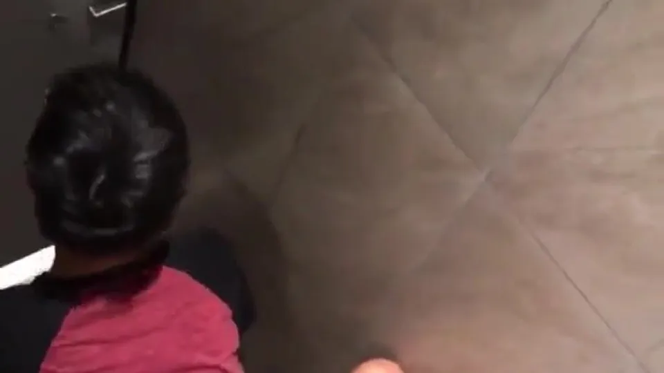 Asian teens in a public toilet