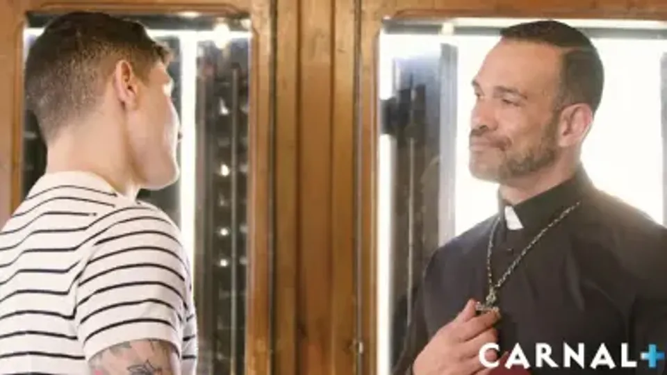 muscular man and priest engage in passionate encounter