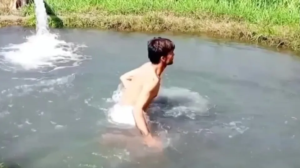 Pakistani Villager's Outdoor Bath
