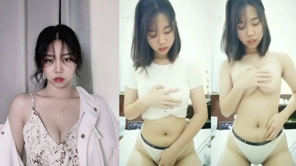 Beautiful girl with splayed tits and short hair masturbates  