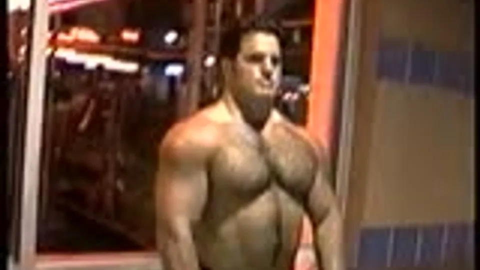 Big Muscular Ballplayer Tries to Pop Football
