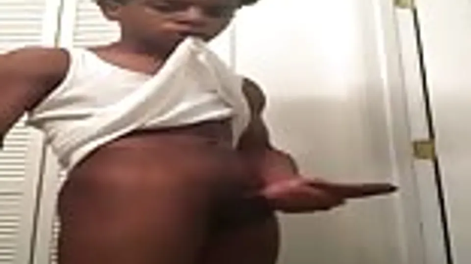 Black Dreamboy Bites In His White Shirt