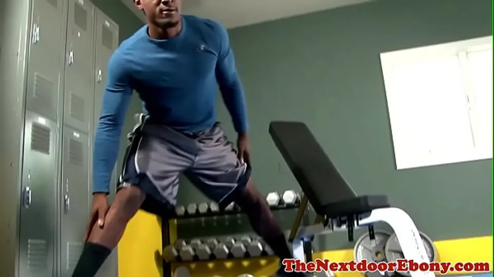 Black hunk masturbates in gym reading porn