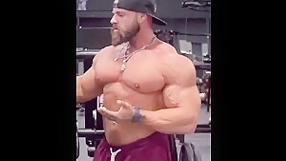 Bodybuilder Daddy Applying Cream