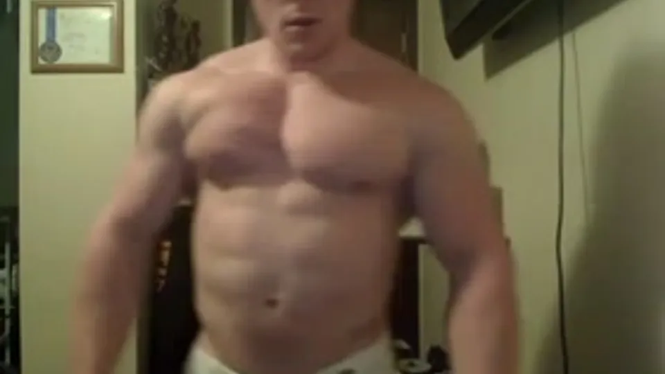 bodybuilder james flexing