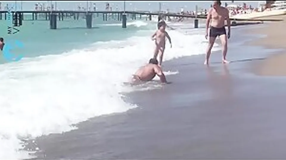 Bodybuilder Show-Off at the Beach