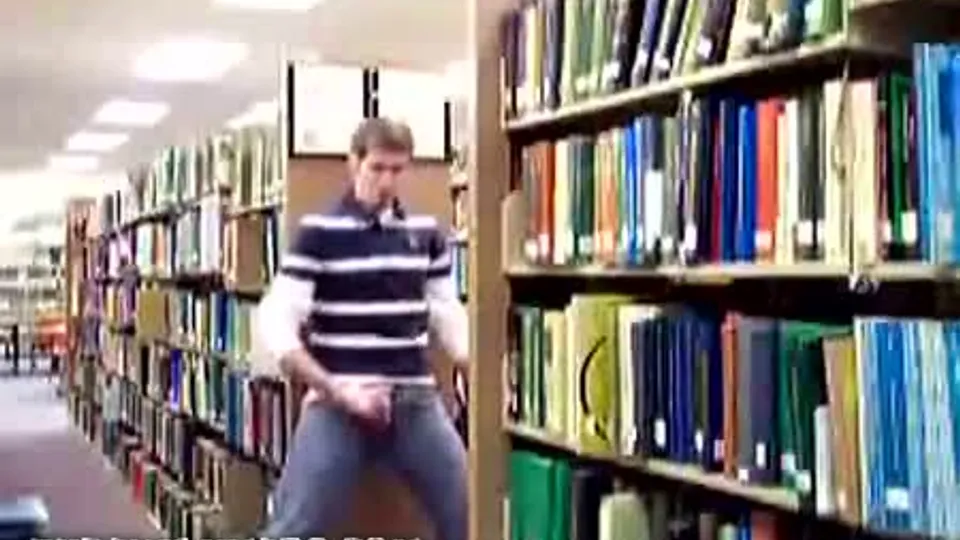 boy jerks off in the library