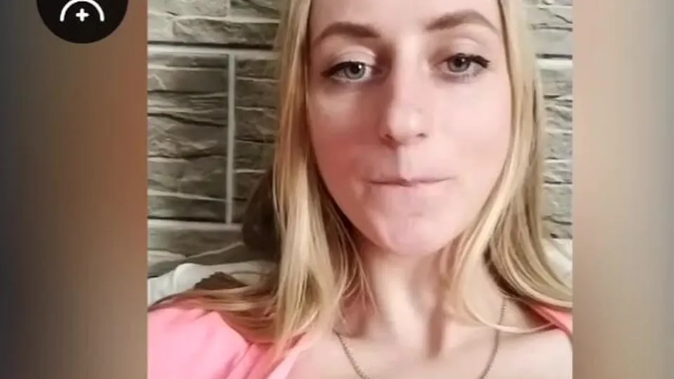 Busty girl's reaction to self-sucking
