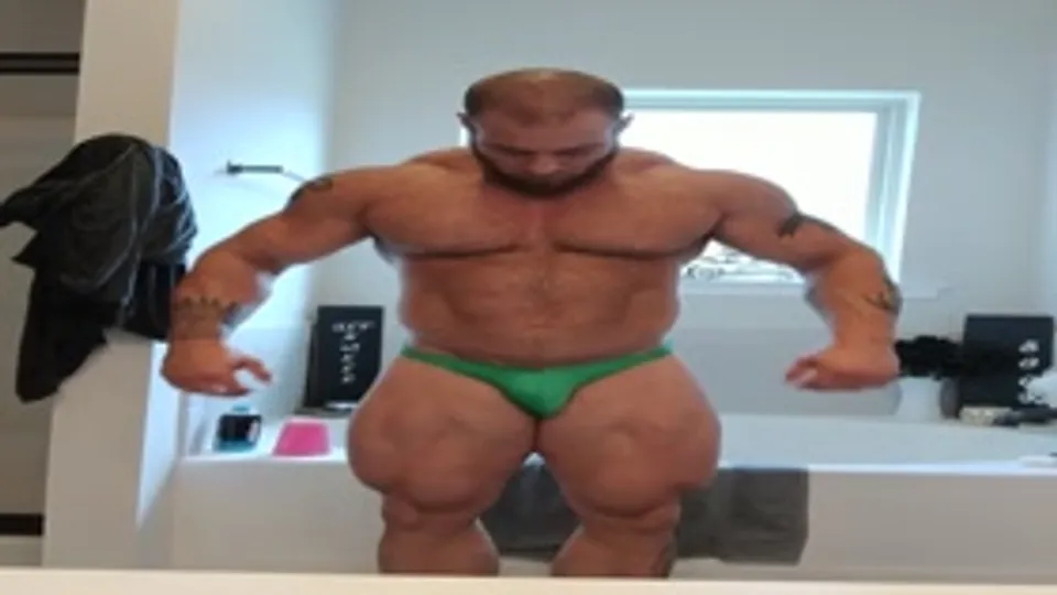 Caleb Blanchard green skimpy posing suit