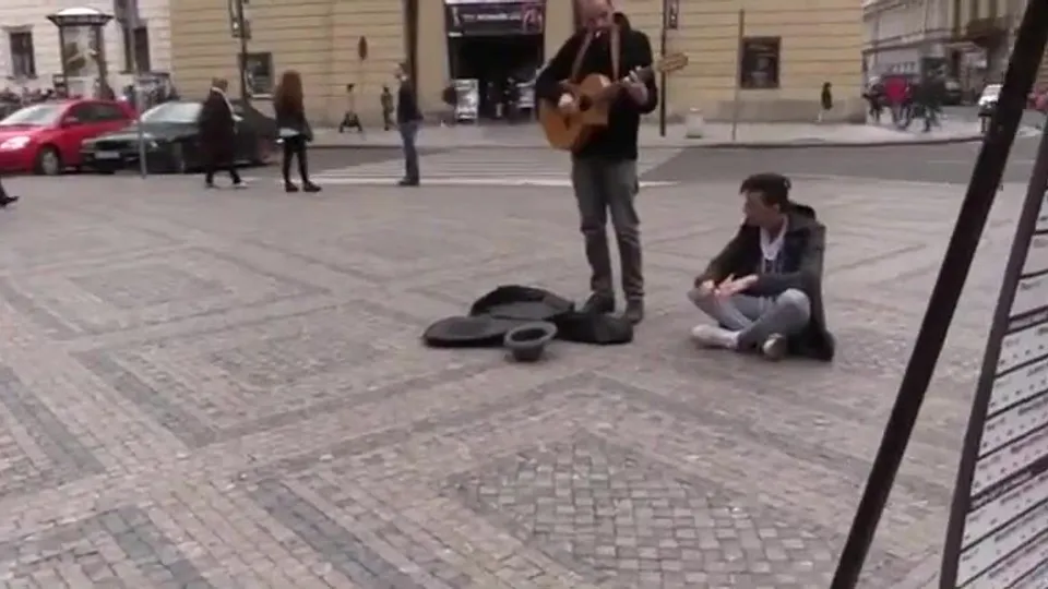 Young Guy in Grey Hoodie Services Camera Guy