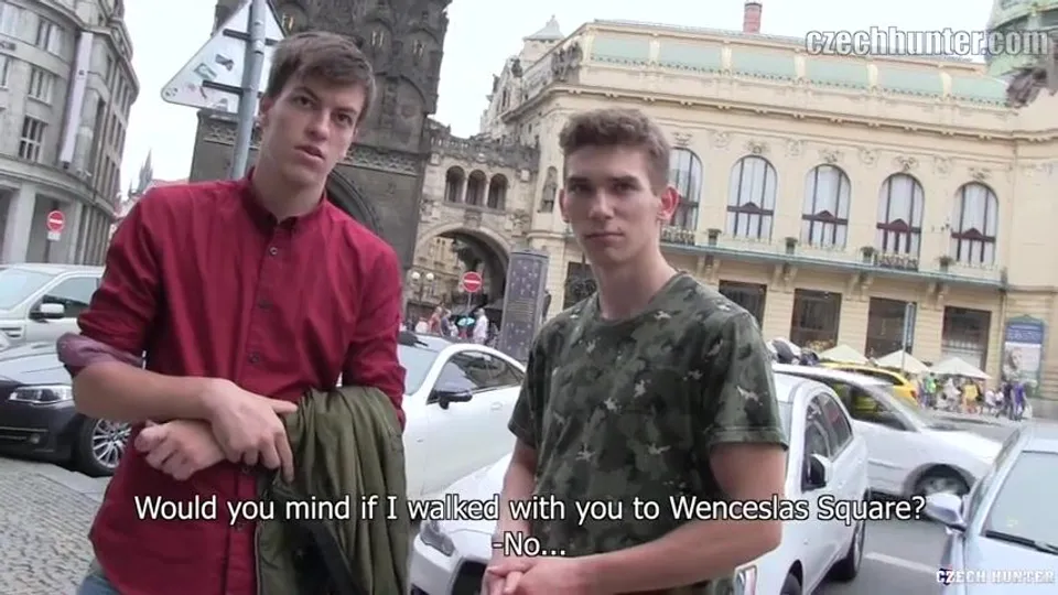CH 371, Camera guy pays 2 young guys, one in a camo shirt, the other in a red shirt,