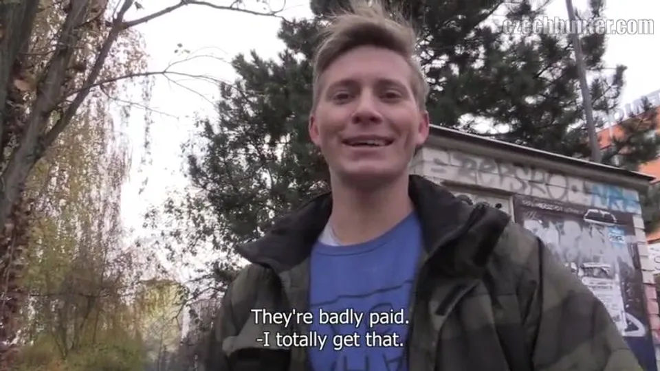 Green Jacket Twink Services Camera Guy
