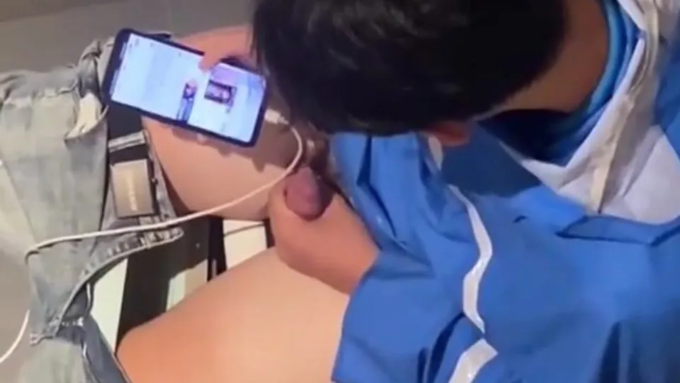 Chinese boy plays in the toilet