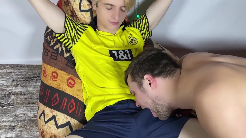 Coach's Post-Match Passion with Young Footballer