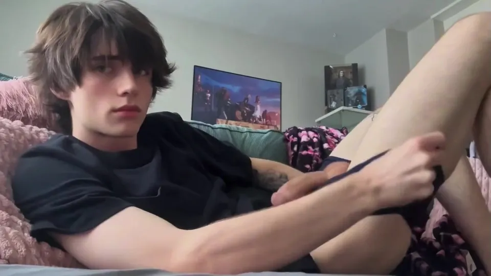 College boy home alone sits back and jerks off