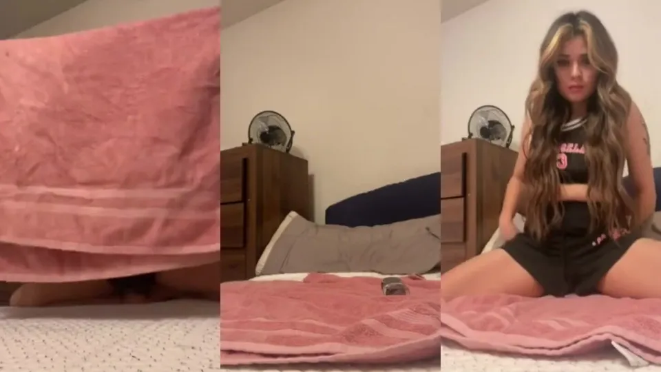 Curly girl uses bed and dildo to satisfy her needs  