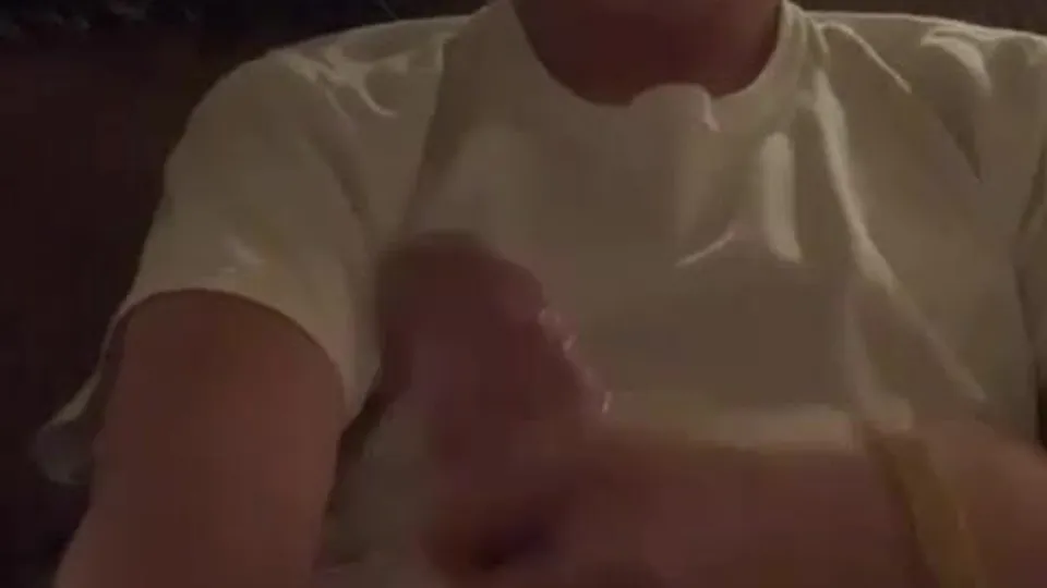 Curly headed boy enjoys his slippery cock