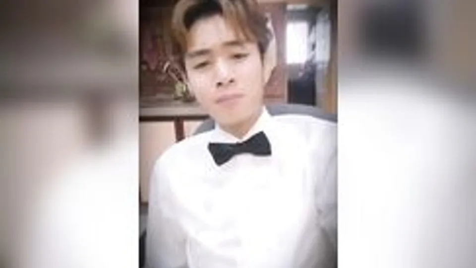 cute asian chef soaks his shirt
