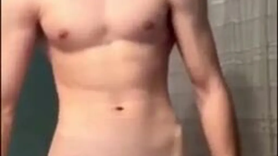 Cute brunette before shower showing his big cock