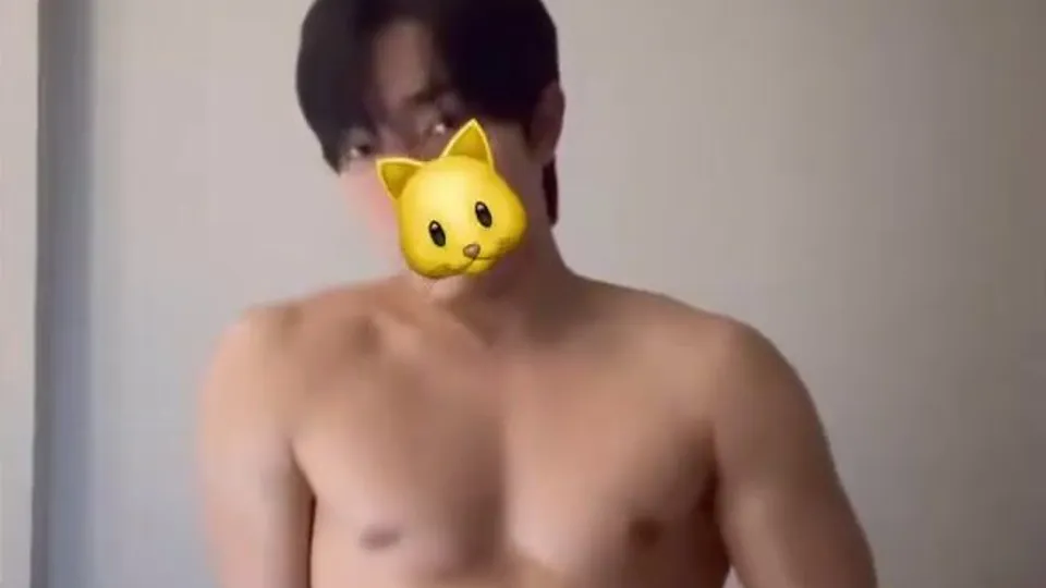Cute korean boy plays with his erection