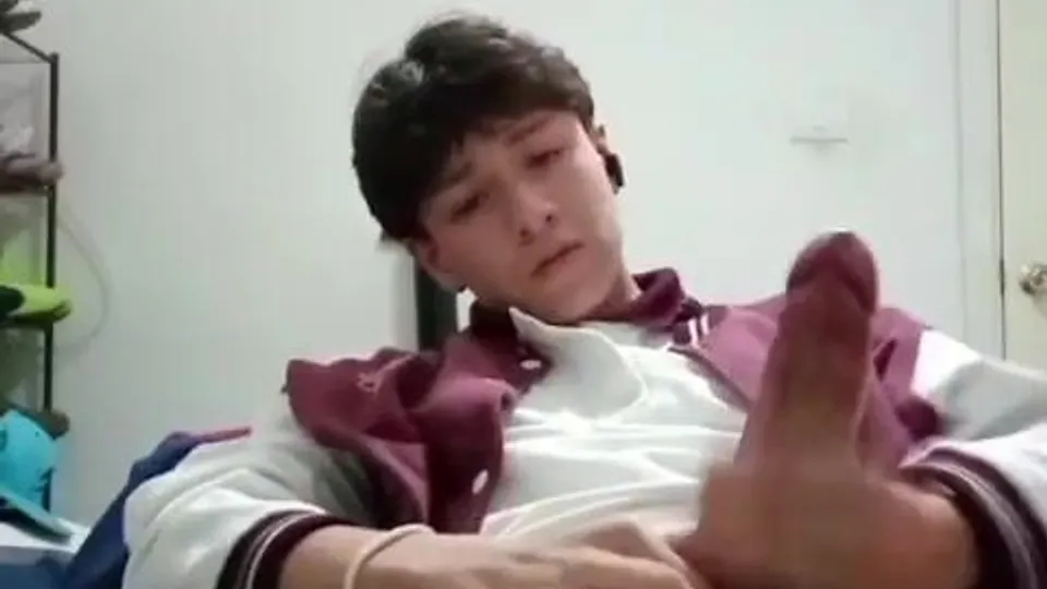 Cute twink jerks off his giant cock