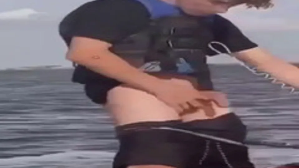 Cute white boy on a jet ski flashes floppy cock - ThisVid.com