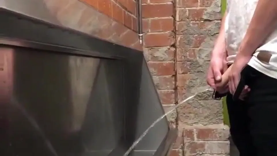 Cute young guy @ urinal - ThisVid.com