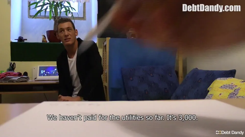 money guy pays off debt of young man in white t-shirt and black jacket