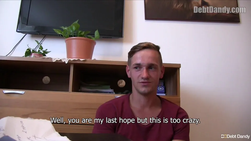 Gay Debt Payment: Young Man in Burgundy T and Blue Shorts Services Money Guy