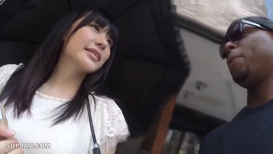 Asian Girl and Black Guy Under Umbrella
