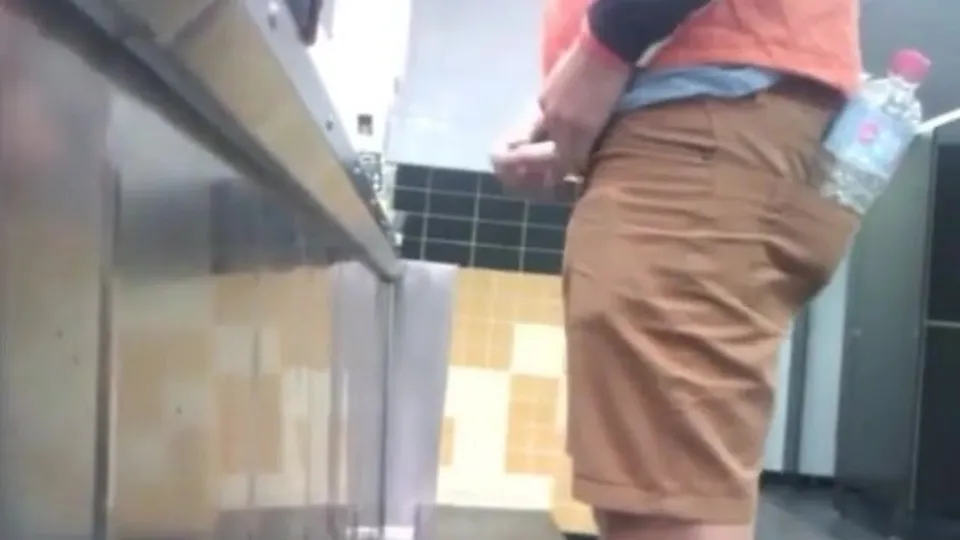 Fellows in the urinals taking seep