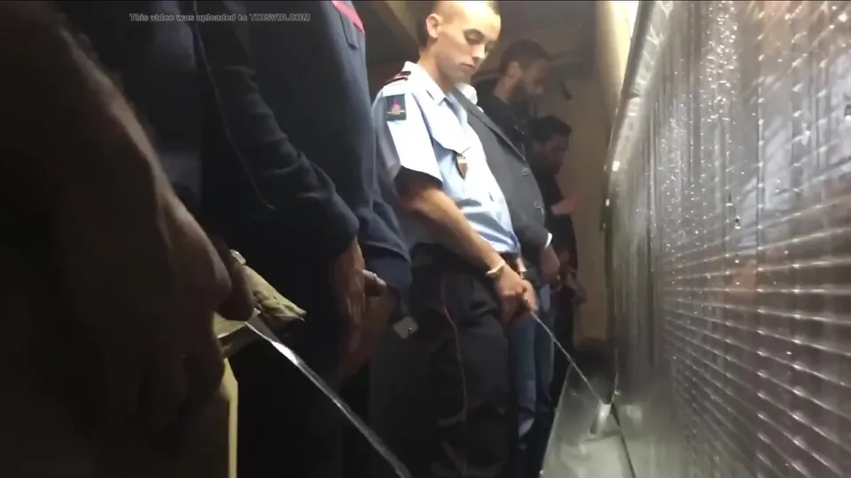 Fireman looking at co-workers dick at urinal - ThisVid.com