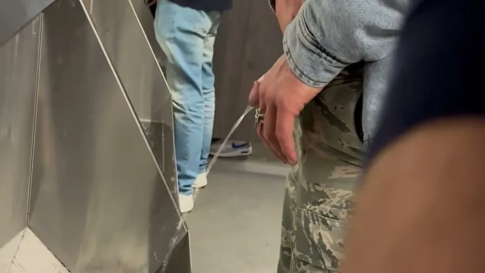 Lad Pissing in Club
