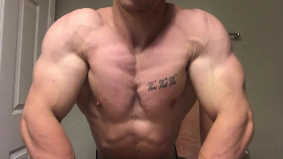 Flexing muscle god - video 2 - ThisVid.com