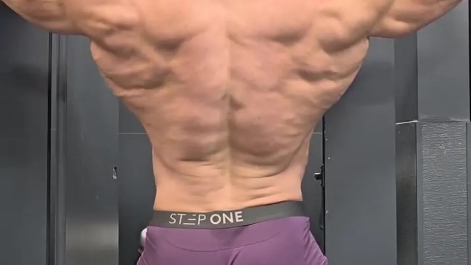 Muscular Wrestler Shows Off