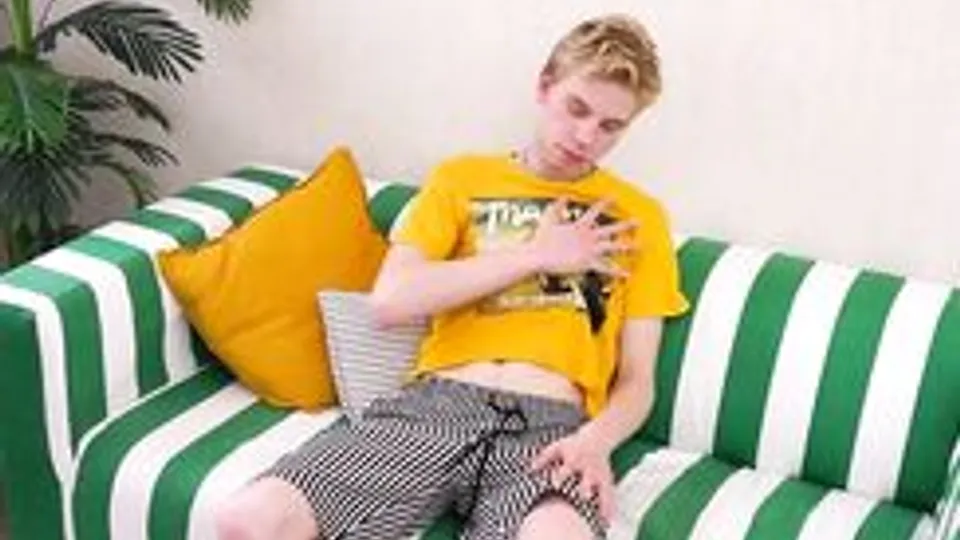 Twink John Masturbates on Striped Sofa