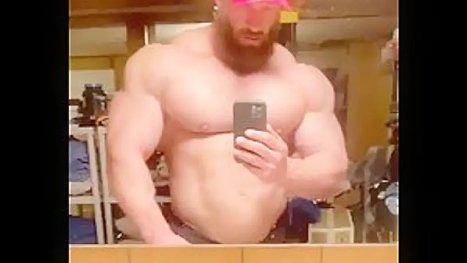 Giant man mirror posing and heavy breathing