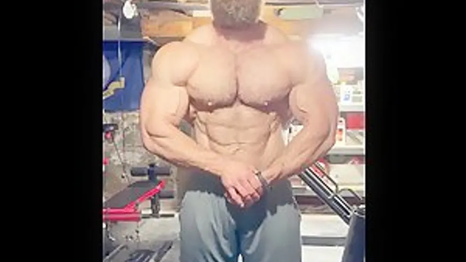 Giant man posing in basement