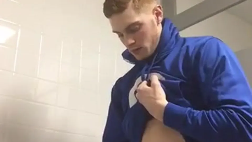 Ginger college athlete wanking in bathroom stall - ThisVid.com