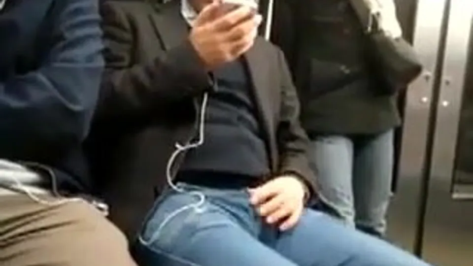 Guy grabbing his bulge on the metro - ThisVid.com