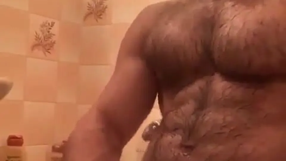 Hairy guy jerks off in the shower - ThisVid.com