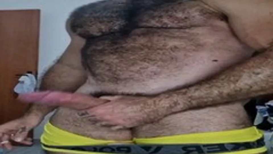 Hairy macho latino daddy smokes and strokes - ThisVid.com