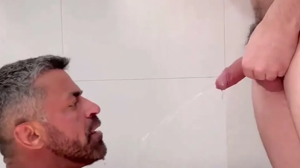 Hairy muscular daddy gets a golden shower - ThisVid.com